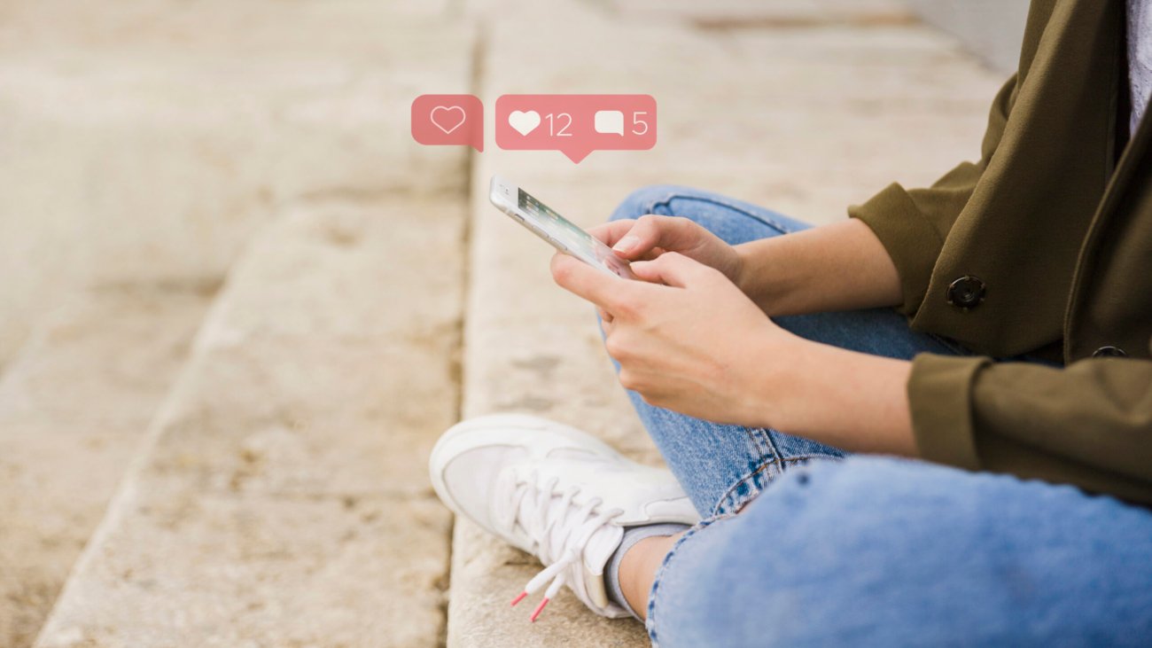 close-up-woman-sitting-stairs-using-social-media-app-mobile